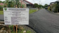 Dinas PUPR Gelontorkan Rp978.505.193,00. Aspal Jalan Perumahan Pondok Karet